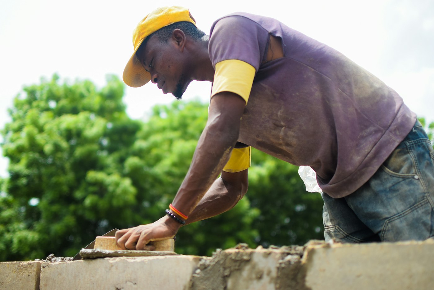 Bricklayer at work on a project in Ibadan, Nigeria